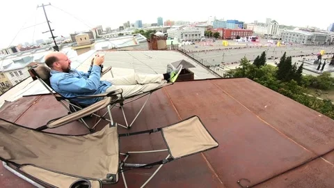 A beautiful view and a scene on how a lonely spectator looks Stock-Footage 129767967
