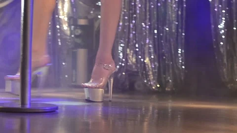 A beautiful view and a scene on striptease Stock-Footage 129764313