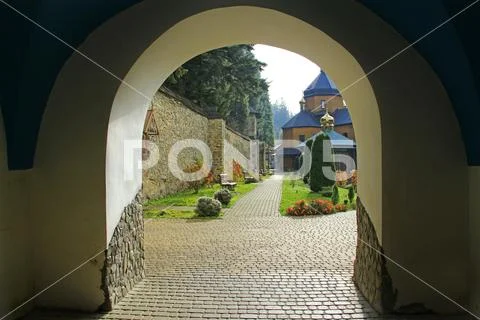 Beautiful view from arch in Manyava Skete. Spiritual place in Western Ukraine Stock Photos