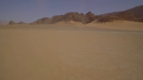 Beautiful view from the back of a moving car in desert Stock Footage 102896087