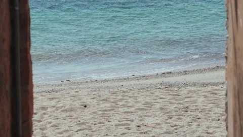 Beautiful view of the beach from the old stone lane. Small village by the sea Stock Footage 154712995