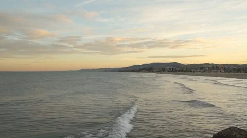Beautiful view of beach at sunset and quiet sea Video stock 73287963