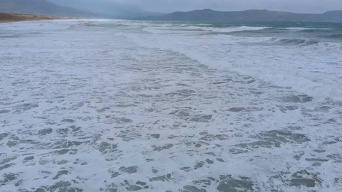 Beautiful view of big waves on ocean beach. Strong wind. Stock Footage 119790255