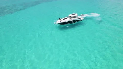 Beautiful view of Bimini beach and a yacht visiting Stock Footage 232437508