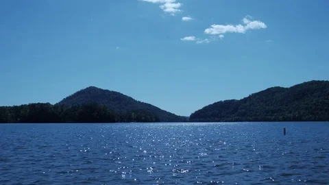 A beautiful view of a blue river and mountains  Stock Footage 75386483