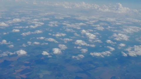 Beautiful view of the blue sky with clouds from the porthole of the plane during 库存影片 80275150