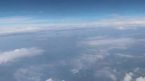 Beautiful view of the blue sky from the plane window Stock Footage 128743120