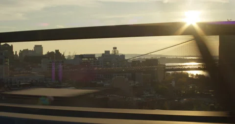 Beautiful view of Brooklyn Bridge at magic hour with golden light and anamorphic Stock Footage 152780486