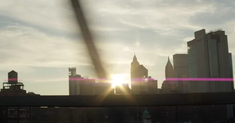 Beautiful view of Brooklyn Bridge at magic hour with golden light and anamorphic Stock Footage 152780898