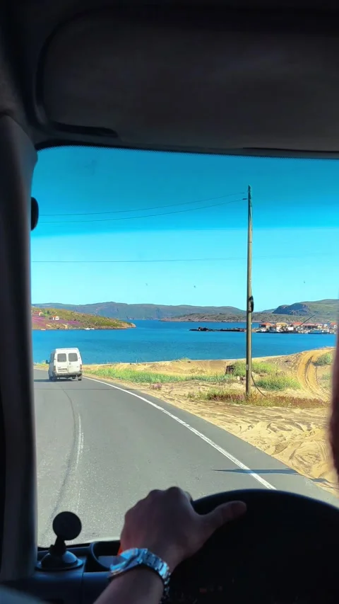 Beautiful view from the car window. Car driving along the seashore. Stock Footage 291917446