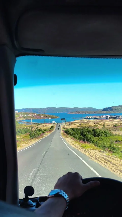 Beautiful view from the car window. Car driving along the seashore. Stock-Footage 291953932