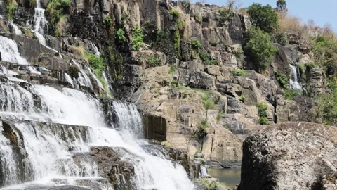 Beautiful view of a cascading waterfall. Stock Footage 276824091