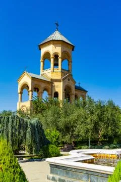 Beautiful view to chapel on site to Sameba Cathedral Tsminda in Tbilisi Holy  Stock Photos