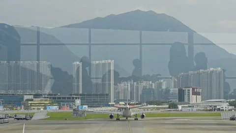 Beautiful view of city through window and reflections of people walking at 動画素材 119990553