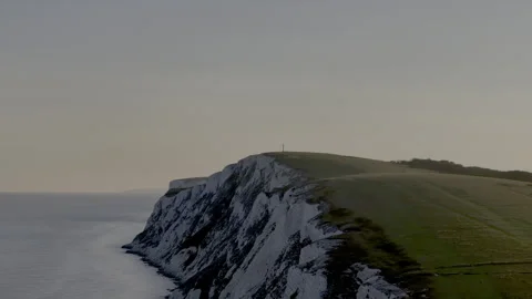 A beautiful view of a cliff overlooking the ocean Video stock 298276509