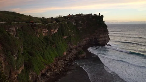 Beautiful view from the cliffs to the ocean and sunset, Uluwatu Bali Stock Footage 88337000