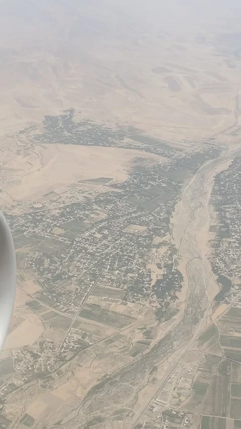 Beautiful view of clouds and earth from the airplane window. Stock Footage 320284417
