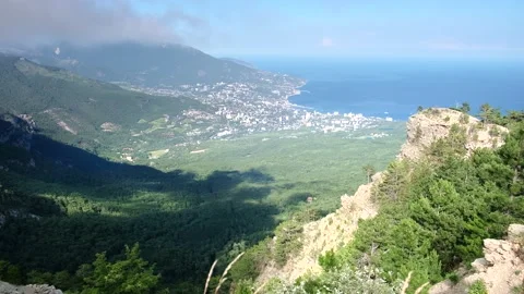 Beautiful view with clouds and rocks from the top of Mount Ai-Petri to the sea Stock Footage 140287472