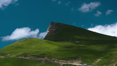 Beautiful view of the clouds moving over the rock. Stock Footage 284117545
