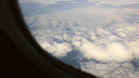 Beautiful View of The Clouds from a Plane Window Stock Footage 89762522