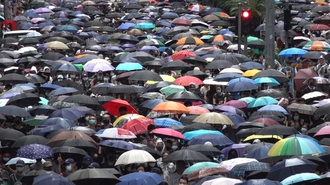 Beautiful view crowds umbrellas protest march politics Hong Kong China Video stock 119160128