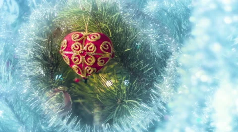Beautiful view dolly moving camera shot. Christmas pine tree. Red heart toy. Stock Footage 45819946