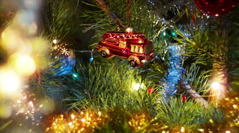 Beautiful view dolly moving camera shot. Christmas pine tree. Red toy. Stock Footage 45819947