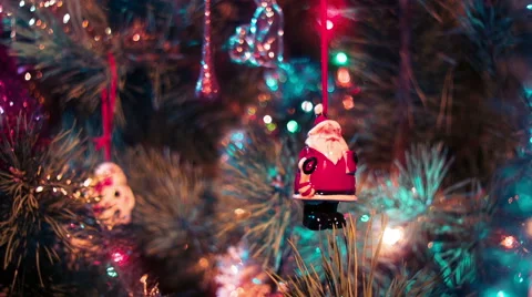 Beautiful view dolly moving camera shot. Christmas pine to Santa Claus toy. Stock Footage 45819986