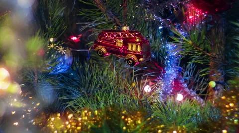 Beautiful view dolly moving camera shot. Christmas pine tree. Red toy. Stock Footage 45819990