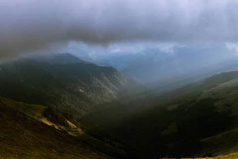 Beautiful view with dramatic sunset on nature of Rodna mountains in Romania. Stock Photos