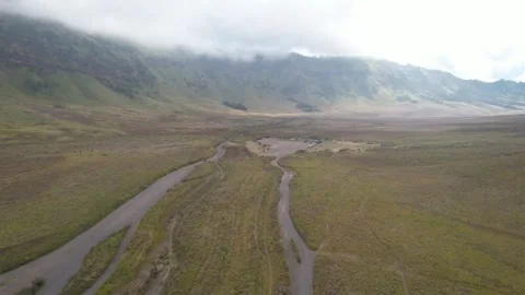 The beautiful view from a drone of mountains full of savanna and misty mountains Stock Footage 258313012