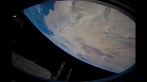 Beautiful view of the Earth's movement outside the ISS window Stock Footage 314041931