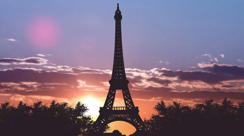 Beautiful view of the Eiffel Tower against the background of sunset. Time lapse Stock Footage 64263693
