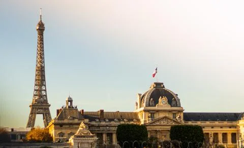 Beautiful view of an Eiffel tower and a military school under a clear sky in Photos
