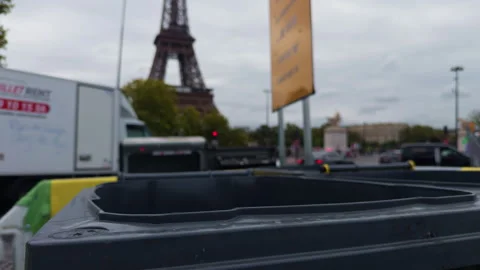 A beautiful view of the Eiffel Tower can be seen from the nearby traffic amidst Stock Footage 318497178