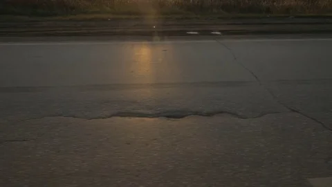 Beautiful view on evening sunset from window driving car on highway road Stock Footage 82733317