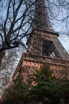 Beautiful view of the famous Eiffel Tower in Paris, France during magical sunset Stock Photos
