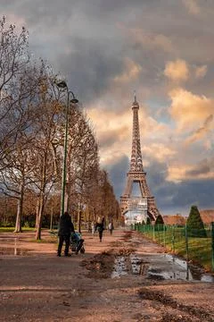 Beautiful view of the famous Eiffel Tower in Paris, France during magical sunset Stock Photos
