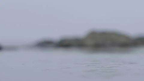 Beautiful view of a floating river and a rock falling in it Stock Footage 132859074