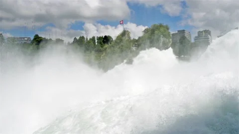 A beautiful view of a flowing, powerful waterfall in Switzerland. Stock Footage 111517966
