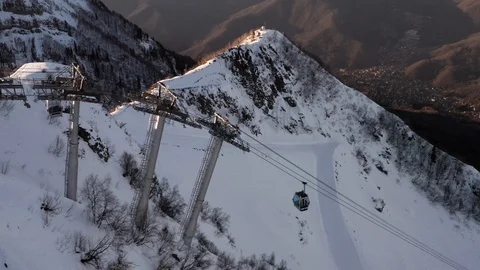 Beautiful view from flying drone ski elevator moving snowy slope winter resort Stock Footage 122037910