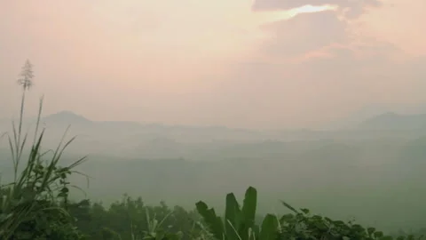 Beautiful view of the green mountains in the mist Stock Footage 73569610