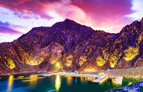 Beautiful view of Hatta Dam or Lake and Hajar Mountain in the Emirate of Dubai. Stock Photos