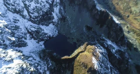 A beautiful view of a high-mountain lake in a picturesque gorge of the Caucasus Stock Footage 163314000