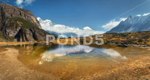 Beautiful view with high rocks with snow covered peaks, mountain Stock Photos
