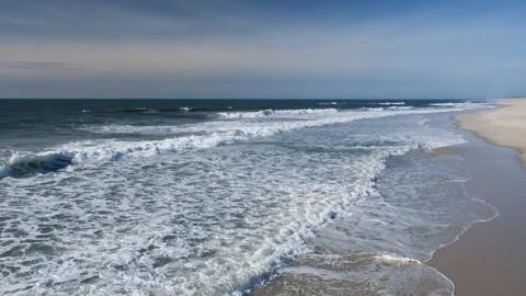 Beautiful View on high waves on the empty coast of the Atlantic Ocean. Deserted Video stock 219357714