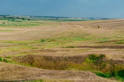 Beautiful view from the hill on the fields in the fall. Stock Photos