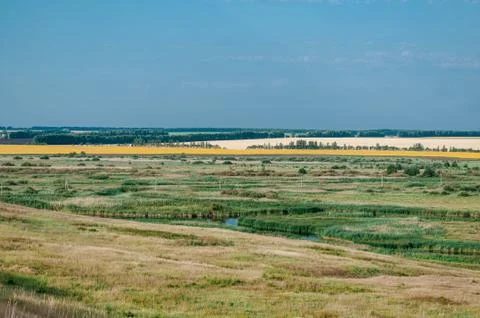 Beautiful view from the hill on the fields in the fall. 写真素材