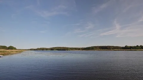 Beautiful view of lake on backdrop of forest. Sweden. Stock Footage 251811610