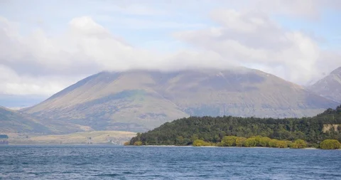 Beautiful view of lake surrounded with mountain ranges Stock Footage 93601909